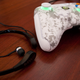 Illustration for article titled Mad Catz Modern Warfare 2 Throat Mic and Controller Review (Xbox 360)